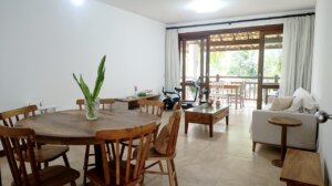 Sala integrada do apartamento Reserva Imbassaí
