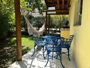 Varanda da casa em condomínio em Imbassaí