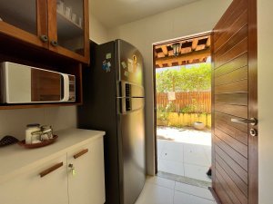 Cozinha da casa em condomínio em Imbassaí